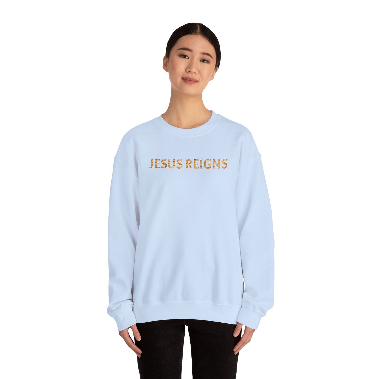 Embroidered Jesus Reigns Unisex Heavy Blend Crewneck Sweatshirt