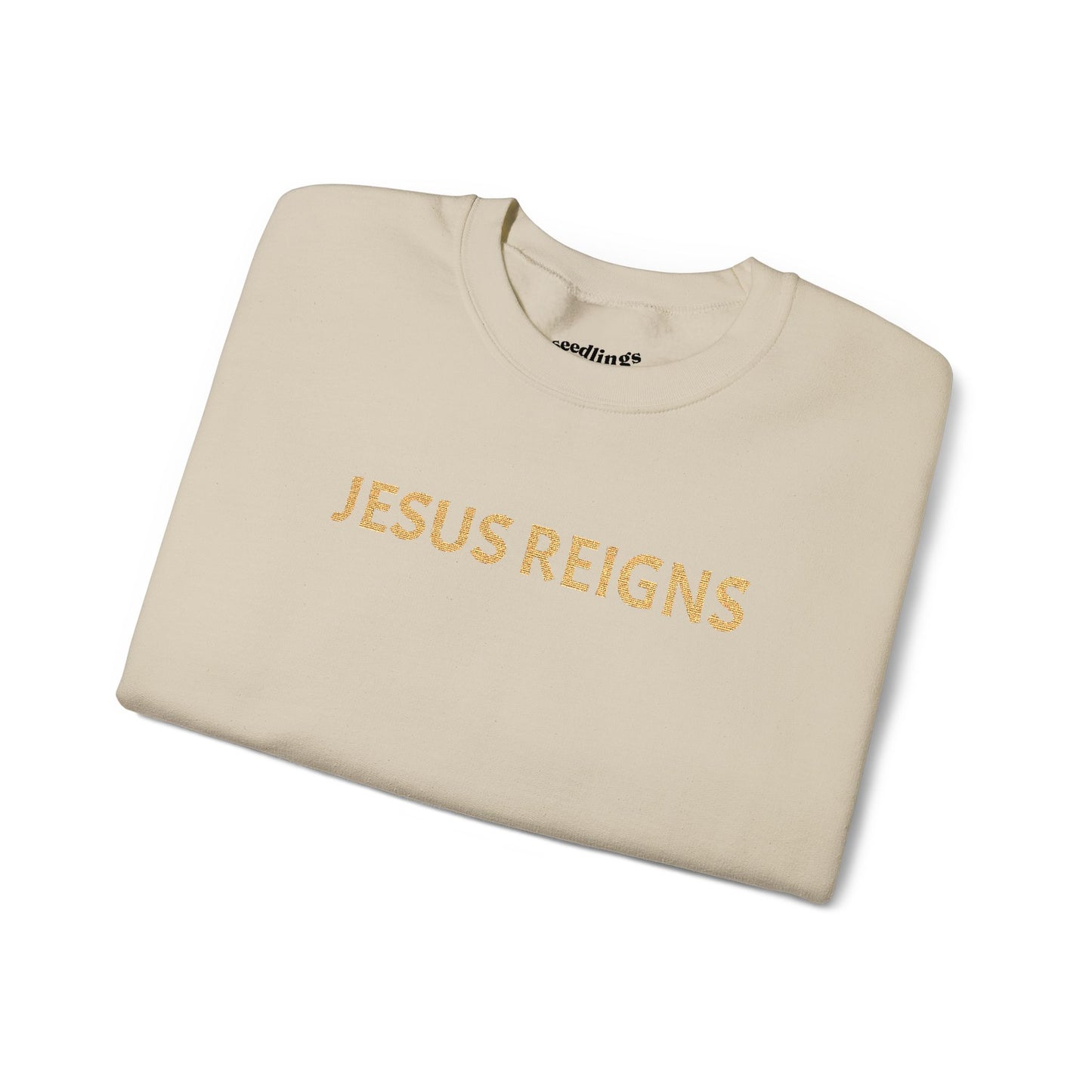 Embroidered Jesus Reigns Unisex Heavy Blend Crewneck Sweatshirt
