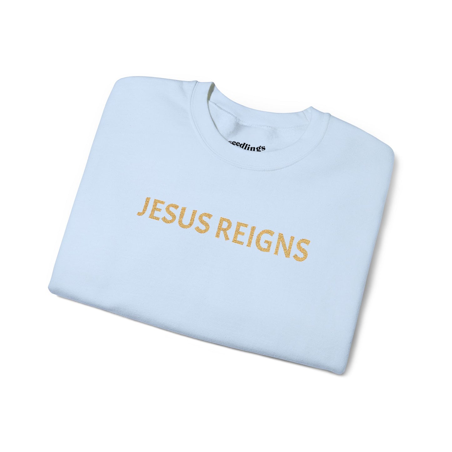 Embroidered Jesus Reigns Unisex Heavy Blend Crewneck Sweatshirt