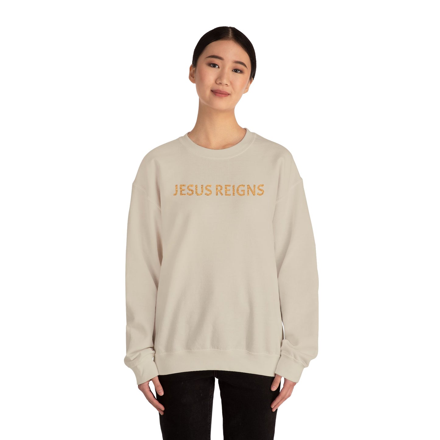 Embroidered Jesus Reigns Unisex Heavy Blend Crewneck Sweatshirt