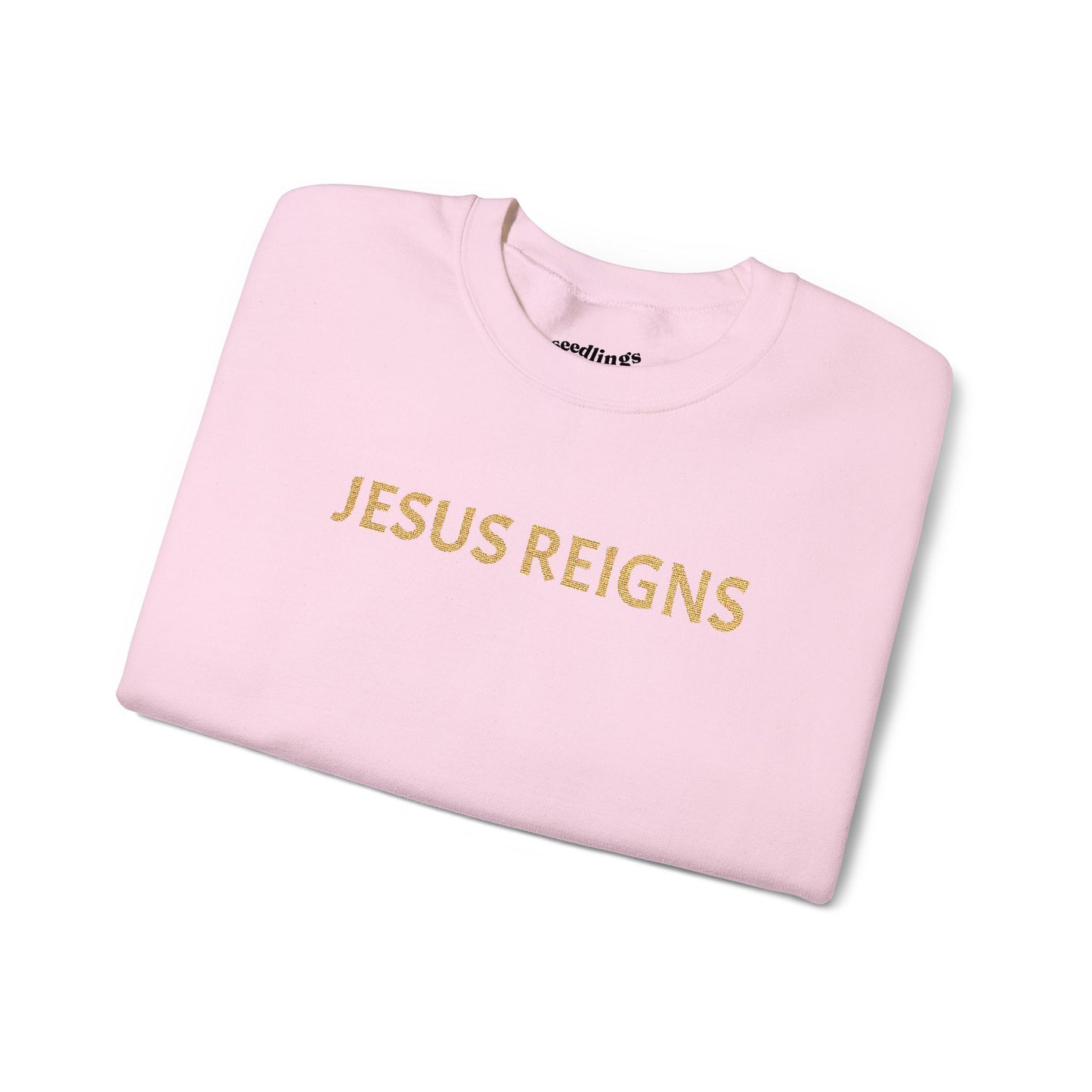 Embroidered Jesus Reigns Unisex Heavy Blend Crewneck Sweatshirt